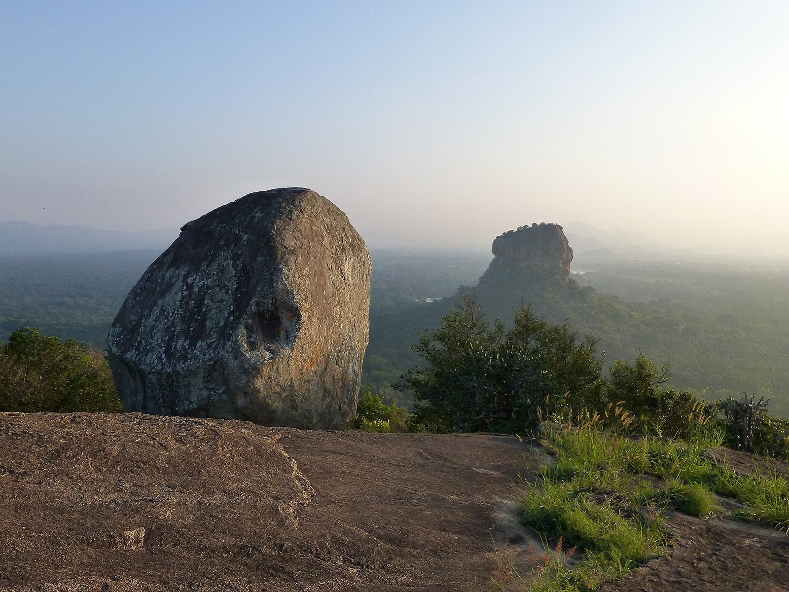 Sigiriya rock seen from the summit of Pidurangala at dawn