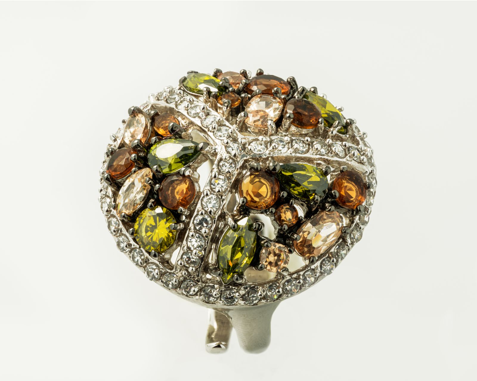 A silver ring with sparkling multicoloured gemstones A silver ring with sparkling multicoloured gemstones