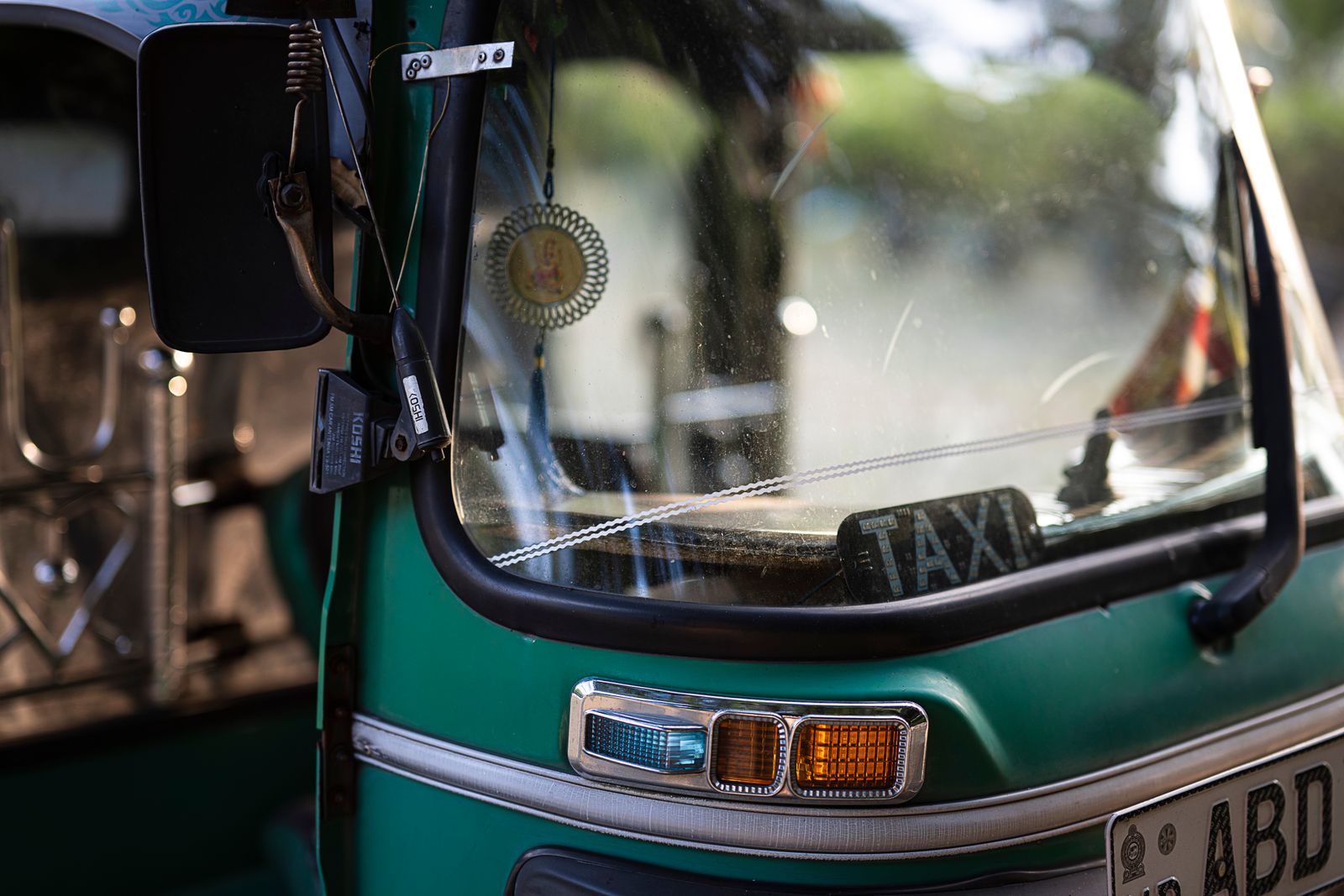 A green tuk-tuk taxi in Colombo, Sri Lanka A green tuk-tuk taxi in Colombo, Sri Lanka